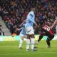 Bournemouth's Antoine Semenyo, second left shoots and scores the opening goal during the English Premier League soccer match between Bournemouth and Manchester City at the Vitality stadium in Bournemouth, England, Saturday, Nov. 2, 2024. (AP Photo/Kirsty Wigglesworth)