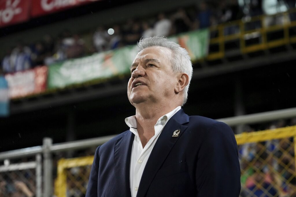 Mexico's coach Javier Aguirre signs his national anthem prior to a CONCACAF Nations League quarterfinals first leg soccer match against Honduras, at Francisco Morazan stadium in San Pedro Sula, Honduras, Friday, Nov. 15, 2024. (AP Photo/Moises Castillo)