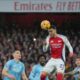 Arsenal's Mikel Merino heads the ball during the English Premier League soccer match between Arsenal and Nottingham Forest at Emirates Stadium in London, Saturday, Nov. 23, 2024. (AP Photo/Kin Cheung)