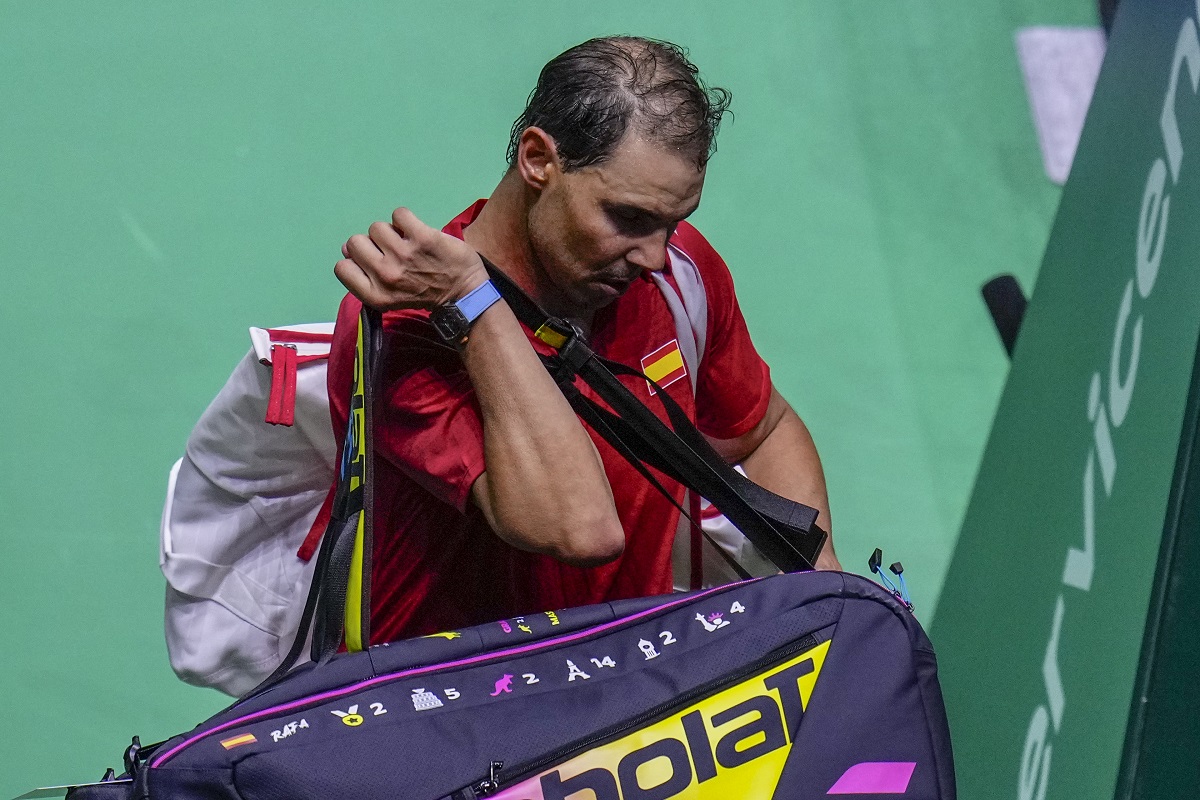 Spain's tennis player Rafael Nadal leaves the court after losing against Netherlands' Botic Van De Zandschulp during a Davis Cup quarterfinal match at Martin Carpena Sports Hall in Malaga, southern Spain, on Tuesday, Nov. 19, 2024. (AP Photo/Manu Fernandez)