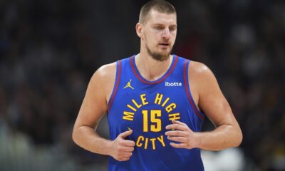 Denver Nuggets center Nikola Jokic turns back to defend after hitting a basket in the second half of an NBA basketball game against the Utah Jazz Saturday, Nov. 2, 2024, in Denver. (AP Photo/David Zalubowski)