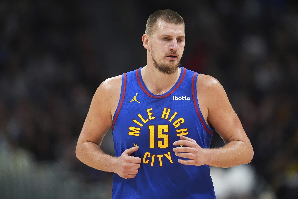 Denver Nuggets center Nikola Jokic turns back to defend after hitting a basket in the second half of an NBA basketball game against the Utah Jazz Saturday, Nov. 2, 2024, in Denver. (AP Photo/David Zalubowski)