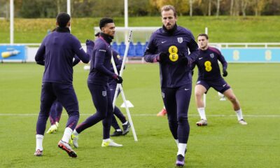 England's Harry Kane, center right, takes part in a national team training session at St George's Park, Burton upon Trent, England, Tuesday, Nov. 12, 2024, ahead of a Nations League soccer match against Greece on Thursday. (Nick Potts/PA via AP)