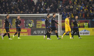 Kosovo players leave the pitch during the UEFA Nations League soccer match between Romania and Kosovo at the National Arena stadium in Bucharest, Romania, Friday, Nov. 15, 2024. (AP Photo/Alexandru Dobre)