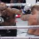 Mike Tyson lands a left to Jake Paul during their heavyweight boxing match, Friday, Nov. 15, 2024, in Arlington, Texas. (AP Photo/Julio Cortez)