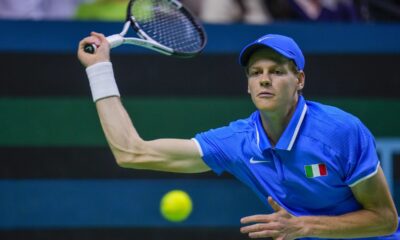 Italy's Jannik Sinner returns the ball to Netherlands' Tallon Griekspoor during the Davis Cup final tennis match between Netherlands and Italy at the Martin Carpena Sports Hall in Malaga, southern Spain, Sunday, Nov. 24, 2024. (AP Photo/Manu Fernandez)