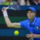 Italy's Jannik Sinner returns the ball to Netherlands' Tallon Griekspoor during the Davis Cup final tennis match between Netherlands and Italy at the Martin Carpena Sports Hall in Malaga, southern Spain, Sunday, Nov. 24, 2024. (AP Photo/Manu Fernandez)