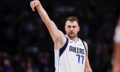 Dallas Mavericks guard Luka Doncic (77) celebrates after a 3-point basket during the first half of an NBA basketball game against the Orlando Magic, Sunday, Nov. 3, 2024, in Dallas. (AP Photo/Gareth Patterson)