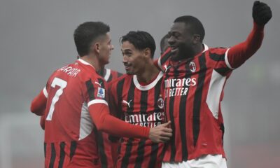 AC Milan's Tijjani Reijnders, center, celebrates with Alvaro Morata, left, and Youssouf Fofana after scoring his side's third goal during the Italian Serie A soccer match between AC Milan and Empoli, at the Milan San Siro stadium, Italy, Saturday, Nov. 30, 2024. (AP Photo/Luca Bruno)