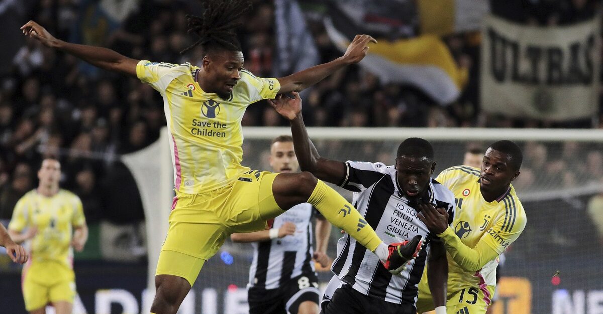 Juventus' Khephren Thuram, left, fights for the ball with Udinese's Keinan Davis during the Italian Serie A soccer match between Udinese and Juventus at the Bluenergy Stadium in Udine, Italy, Saturday, Nov. 2, 2024. (Andrea Bressanutti/LaPresse via AP)