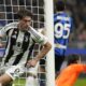 Juventus' Dusan Vlahovic celebrates after scoring his side's opening goal during a Serie A soccer match between Inter Milan and Juventus at the San Siro stadium in Milan, Italy, Sunday, Oct. 27, 2024. (AP Photo/Luca Bruno)