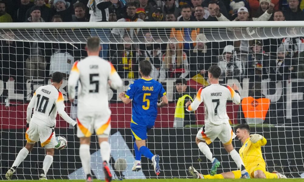 Germany's Kai Havertz, second right, scores his side's third goal during the Nations League group soccer match between Germany and Bosnia in Freiburg, Germany, Saturday, Nov. 16, 2024. (AP Photo/Michael Probst)