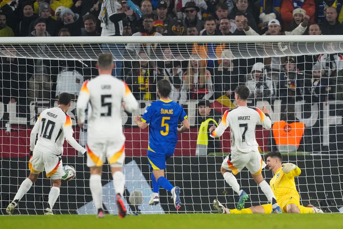 Germany's Kai Havertz, second right, scores his side's third goal during the Nations League group soccer match between Germany and Bosnia in Freiburg, Germany, Saturday, Nov. 16, 2024. (AP Photo/Michael Probst)