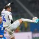 CORRECTS NAMES OF PLAYERS - France's Adrien Rabiot, right, and Italy's Davide Frattesi challenge for the ball during the Nations League soccer match between Italy and France, at the San Siro stadium in Milan, Italy, Sunday, Nov. 17, 2024. (AP Photo/Luca Bruno)