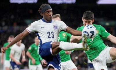 England's Noni Madueke clears the ball away from Ireland's Callum O'Dowda, right, during the UEFA Nations League soccer match between England and the Republic of Ireland at Wembley stadium in London, Sunday, Nov. 17, 2024. (AP Photo/Kin Cheung)