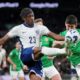 England's Noni Madueke clears the ball away from Ireland's Callum O'Dowda, right, during the UEFA Nations League soccer match between England and the Republic of Ireland at Wembley stadium in London, Sunday, Nov. 17, 2024. (AP Photo/Kin Cheung)