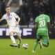 Lyon's Nemanja Matic, left, faces Saint-Etienne's Augustine Boakye during the French League One soccer match between Lyon and Saint-Etienne at the Groupama stadium in Decines, outside Lyon, France, Sunday, Nov. 10, 2024. (AP Photo/Laurent Cipriani)