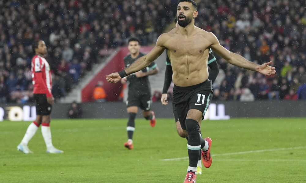 Liverpool's Mohamed Salah celebrates after scoring during the English Premier League soccer match between Southampton and Liverpool in Southampton, England, Sunday, Nov. 24, 2024. (AP Photo/Sean Ryan)