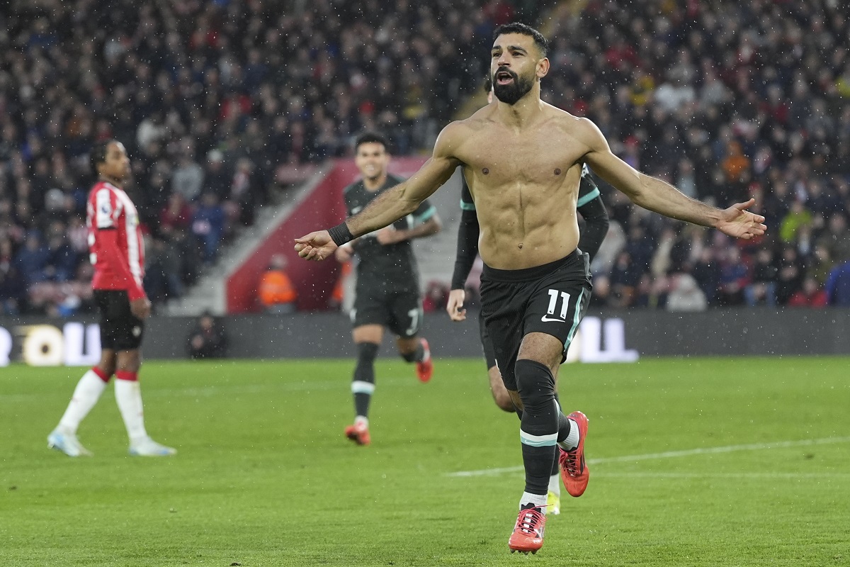 Liverpool's Mohamed Salah celebrates after scoring during the English Premier League soccer match between Southampton and Liverpool in Southampton, England, Sunday, Nov. 24, 2024. (AP Photo/Sean Ryan)