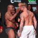 Mike Tyson, left, slaps Jake Paul during a weigh-in ahead of their heavyweight bout, Thursday, Nov. 14, 2024, in Irving, Texas. (AP Photo/Julio Cortez)