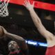 Toronto Raptors guard RJ Barrett (9) drives to the basket as Miami Heat forward Nikola Jovic (5) defends during the second half of an NBA basketball game, Thursday, Dec. 12, 2024, in Miami. (AP Photo/Marta Lavandier)