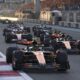 McLaren driver Lando Norris of Britain leads at the start during the Formula One Abu Dhabi Grand Prix at the Yas Marina Circuit in Abu Dhabi, UAE, Sunday, Dec. 8, 2024. (AP Photo/Hamad I Mohammed, Pool)