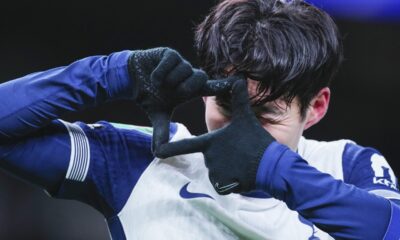 Tottenham's Son Heung-min celebrates after scoring his side's fourth goal during the English League Cup quarter-final soccer match between Tottenham and Manchester United, at the Tottenham Hotspur Stadium in London, Thursday, Dec. 19, 2024. (AP Photo/Dave Shopland )