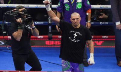 Ukraine's Oleksandr Usyk celebrates after winning the WBA, WBO, and WBC world heavyweight title fight against Britain's Tyson Fury in Riyadh, Saudi Arabia, Sunday, Dec. 22, 2024. (AP Photo/Frank Augstein)