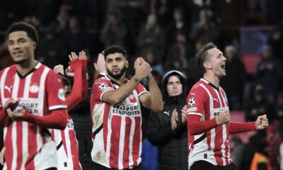 PSV players celebrate after winning their Champions League opening phase soccer match between PSV Eindhoven and Shakhtar Donetsk at the PSV Stadium in Eindhoven, Netherlands, Wednesday, Nov. 27, 2024. (AP Photo/Patrick Post)