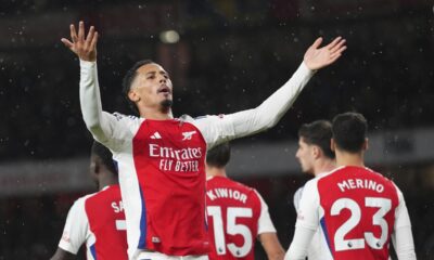 Arsenal's William Saliba celebrates after scoring his side's second goal during the English Premier League soccer match between Arsenal and Manchester United at Emirates stadium in London, Wednesday, Dec. 4, 2024. (AP Photo/Kirsty Wigglesworth)