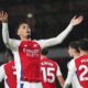 Arsenal's William Saliba celebrates after scoring his side's second goal during the English Premier League soccer match between Arsenal and Manchester United at Emirates stadium in London, Wednesday, Dec. 4, 2024. (AP Photo/Kirsty Wigglesworth)