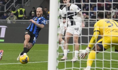 Inter Milan's Federico Dimarco scores during the Serie A soccer match between Inter Milan and Parma at the San Siro stadium in Milan, Italy, Friday, Dec.6, 2024. (AP Photo/Luca Bruno)