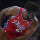 Philadelphia 76ers' Joel Embiid holds the ball during the second half of an NBA basketball game against the Charlotte Hornets, Friday, Dec. 20, 2024, in Philadelphia. (AP Photo/Matt Slocum)