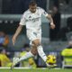 Real Madrid's Kylian Mbappe takes control of the ball during the Spanish La Liga soccer match between Real Madrid and Getafe at the Santiago Bernabeu Stadium in Madrid, Spain, Sunday, Dec. 1, 2024. (AP Photo/Bernat Armangue)