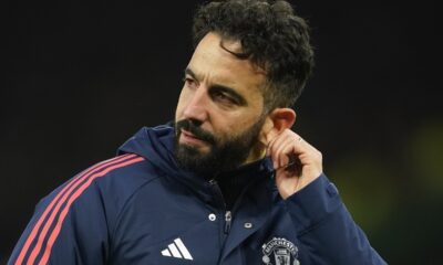 Manchester United's head coach Ruben Amorim pulls on his ear after the English Premier League soccer match between Manchester United and Bournemouth at the Old Trafford stadium in Manchester, England, Sunday, Dec. 22, 2024. (AP Photo/Dave Thompson)