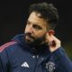 Manchester United's head coach Ruben Amorim pulls on his ear after the English Premier League soccer match between Manchester United and Bournemouth at the Old Trafford stadium in Manchester, England, Sunday, Dec. 22, 2024. (AP Photo/Dave Thompson)