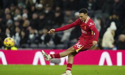 Liverpool's Trent Alexander-Arnold kicks the ball during the English Premier League soccer match between Tottenham and Liverpool at Tottenham Hotspur Stadium in London, Sunday, Dec. 22, 2024. (AP Photo/Dave Shopland)