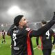 Frankfurt's scorer Omar Marmoush celebrate after scoring his team's third goal during the Bundesliga soccer match between FC Heidenheim and Eintracht Frankfurt at the Voith-Arena in Heidenheim, Germany, Sunday, Dec. 1, 2024. (Jan-Philipp Strobel/dpa via AP)