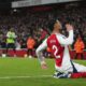 Arsenal's William Saliba celebrates after scoring his side's second goal during the English Premier League soccer match between Arsenal and Manchester United at Emirates stadium in London, Wednesday, Dec. 4, 2024. (AP Photo/Kirsty Wigglesworth)