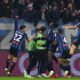 Atalanta's team players celebrate after Ademola Lookman scored his side's second goal during the Italian Series A soccer match between Atalanta and AC Millan at the Gewiss Stadium in Bergamo, Italy, Friday, Dec. 6 , 2024. (Spada/LaPresse via AP)