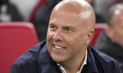 Liverpool's manager Arne Slot sits on the bench during the Champions League opening phase soccer match between Liverpool and Real Madrid at Anfield Stadium, Liverpool, England, Wednesday, Nov. 27, 2024. (AP Photo/Jon Super)