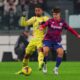 Bologna's Benjamin Dominguez, right, and Juventus' Danilo fight for the ball during the Italian Serie A soccer match between Juventus and Bologna at the Allianz Stadium in Turin, Italy, Saturday, Dec. 7, 2024. (Spada/LaPresse via AP)