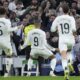 Real Madrid's Kylian Mbappe celebrates after scoring the opening goal during the Spanish La Liga soccer match between Real Madrid and Sevilla at the Santiago Bernabeu Stadium in Madrid, Spain, Sunday, Dec. 22, 2024. (AP Photo/Bernat Armangue)