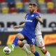 FILE - Schalke's Guido Burgstaller, left, is challenged by Duesseldorf's Andre Hoffman during the German Bundesliga soccer match between Fortuna Duesseldorf and FC Schalke 04 in Duesseldorf, Germany, on May 27, 2020. (AP Photo/Martin Meissner, Pool, File)