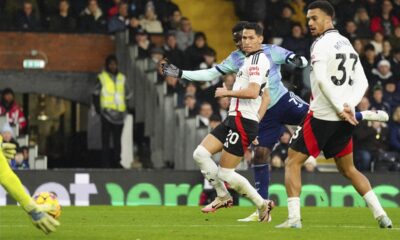 Arsenal's Bukayo Saka, centre, makes an attempt to score during the English Premier League soccer match between Fulham and Arsenal, at the Craven Cottage Stadium in London, Sunday, Dec. 8, 2024. (AP Photo/Dave Shopland)