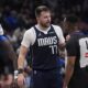 Dallas Mavericks guard Luka Doncic (77) questions a call by referee Sean Wright (4) during the first half of an NBA basketball game against the Portland Trail Blazers, Monday, Dec. 23, 2024, in Dallas. (AP Photo/LM Otero)