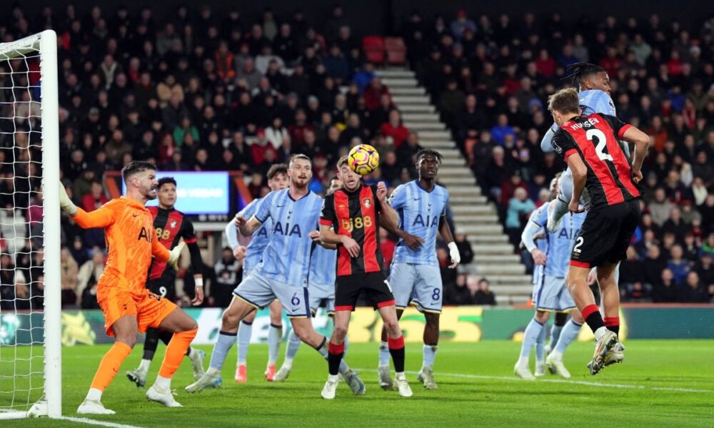 Bournemouth's Dean Huijsen, right, scores the opening goal during during the English Premier League soccer match between AFC Bournemouth and Tottenham Hotspur in Bournemouth, England, Thursday, Dec. 5, 2024. (Adam Davy/PA via AP)