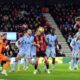 Bournemouth's Dean Huijsen, right, scores the opening goal during during the English Premier League soccer match between AFC Bournemouth and Tottenham Hotspur in Bournemouth, England, Thursday, Dec. 5, 2024. (Adam Davy/PA via AP)