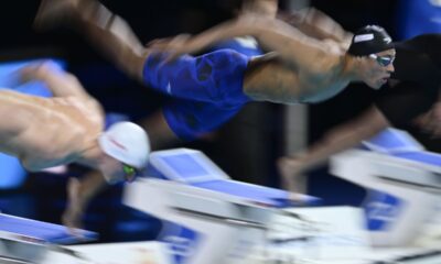 Jordan Crooks of the Cayman Islands starts the 100-meter freestyle semifinal at the World Short Course Swimming Championships in Budapest, Hungary, Wednesday, Dec. 11, 2024. (AP Photo/Denes Erdos)