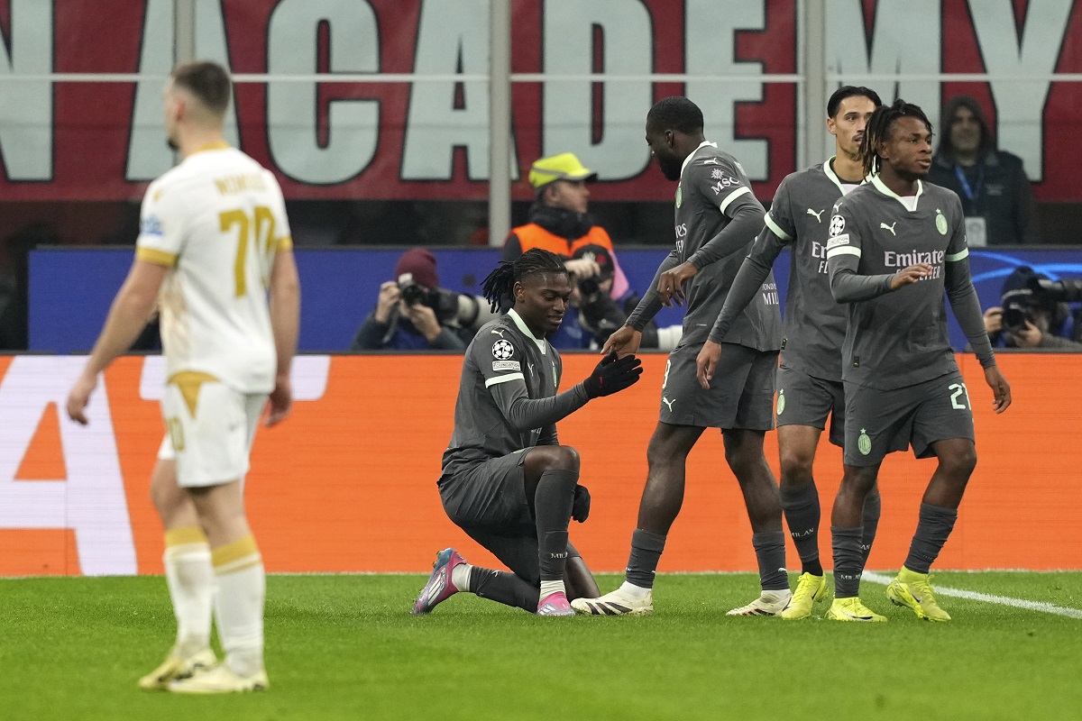 AC Milan's Rafael Leao celebrates with teammates after scoring his sides first goal during the Champions League opening phase soccer match between AC Milan and Red Star Belgrade, Crvena Zvezda, at the San Siro stadium in Milan, Italy, Wednesday, Dec. 11, 2024. (AP Photo/Antonio Calanni)